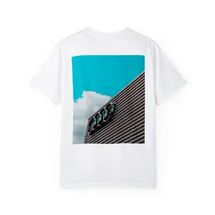 Audi Logo on Building Against Blue Sky