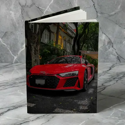 Red Audi R8 Parked On Tree Lined Street