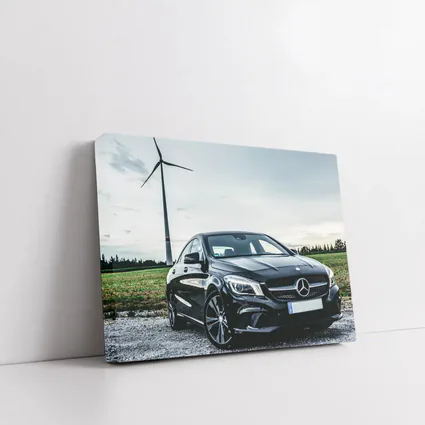 Black Mercedes CLA Parked Near Wind Turbine