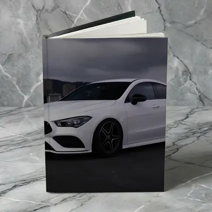 Mercedes CLA White Sedan Stormy City