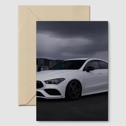 Mercedes CLA White Sedan Stormy City