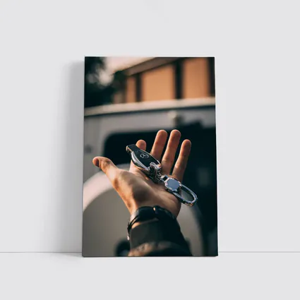 Mercedes Key Held in Hand Outdoors