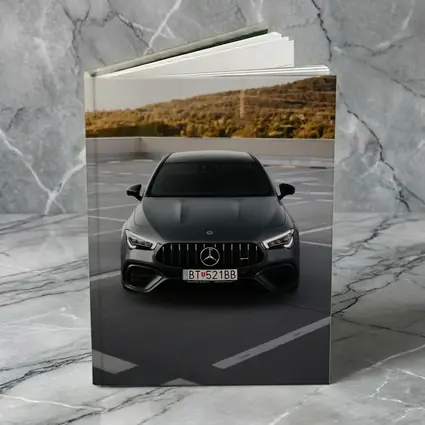 Mercedes AMG Gray Sedan Rooftop Parking