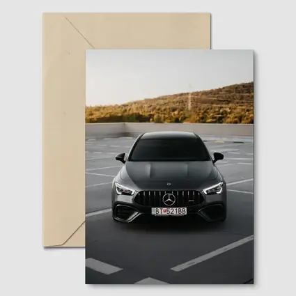 Mercedes AMG Gray Sedan Rooftop Parking