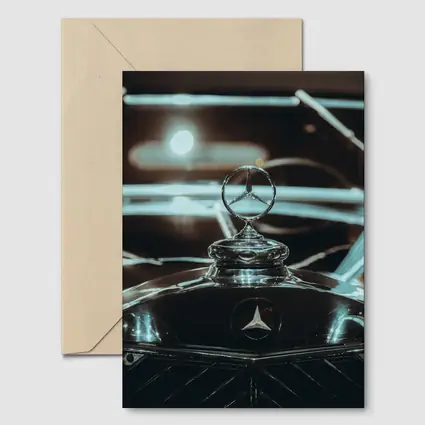 Mercedes Classic Hood Ornament Dark Background