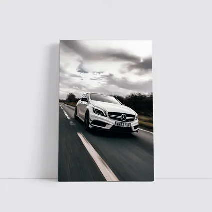 Mercedes AMG White Hatchback On Open Road