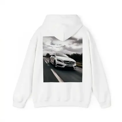 Mercedes AMG White Hatchback On Open Road