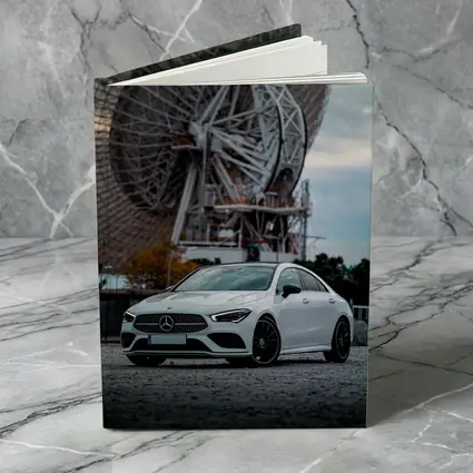 White Mercedes CLA Parked Near Radio Telescope