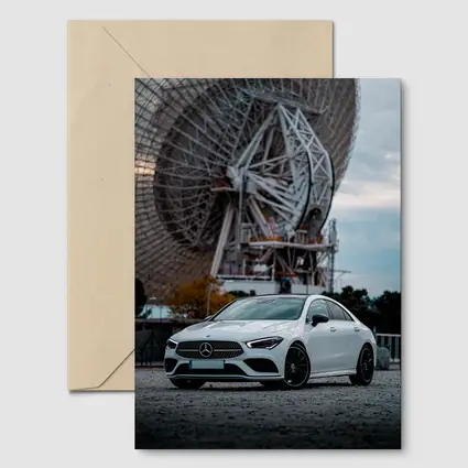 White Mercedes CLA Parked Near Radio Telescope