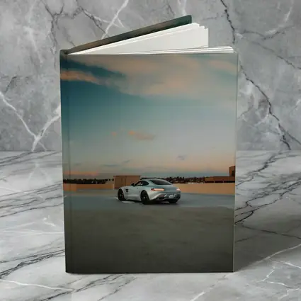 Mercedes AMG GT Silver Rooftop Sunset Sky
