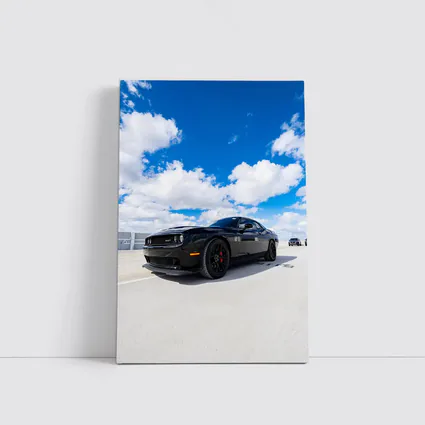Black Dodge Challenger SRT Under Blue Sky