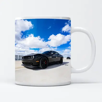Black Dodge Challenger SRT Under Blue Sky