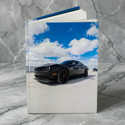 Black Dodge Challenger SRT Under Blue Sky