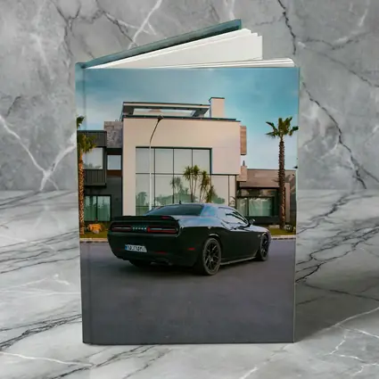 Black Dodge Challenger Parked Outside Modern Villa
