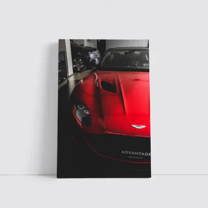 Red Aston Martin Vanquish Inside Dealership Showroom