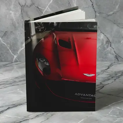 Red Aston Martin Vanquish Inside Dealership Showroom