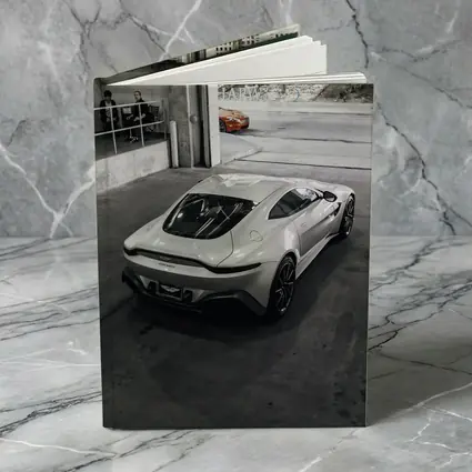 Aston Martin Vantage White Parked Urban Garage