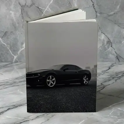 Black Chevrolet Camaro Foggy Urban Scene