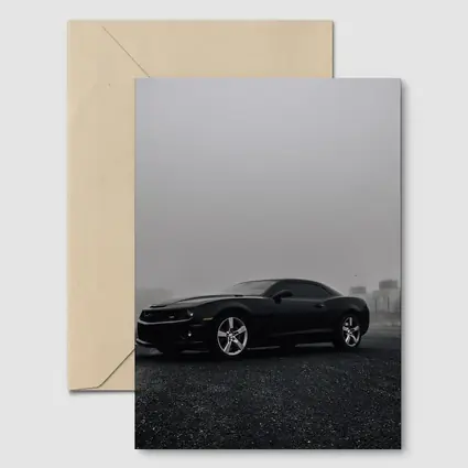 Black Chevrolet Camaro Foggy Urban Scene