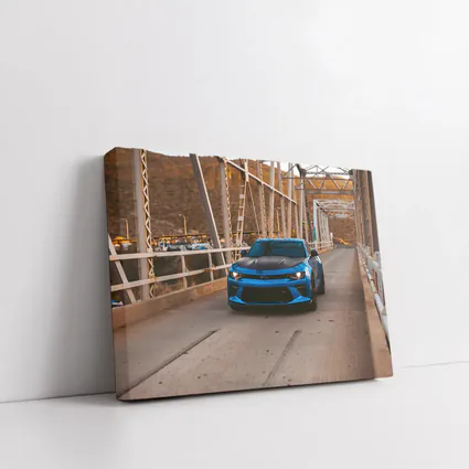 Blue Chevrolet Camaro on Steel Bridge