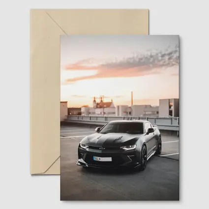Black Chevrolet Camaro Rooftop Sunset Parking