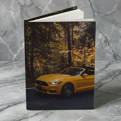 Yellow Ford Mustang Convertible Forest Road