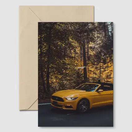 Yellow Ford Mustang Convertible Forest Road