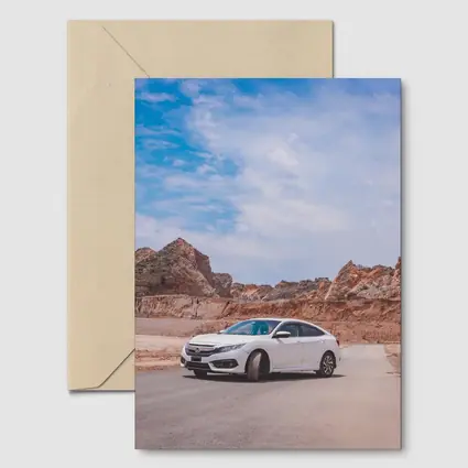 White Honda Civic Rocky Desert Landscape