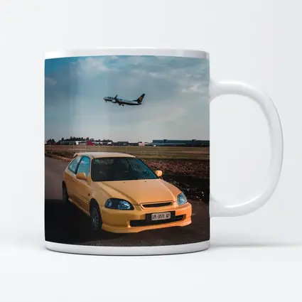 Yellow Honda Civic EK Hatchback Airport