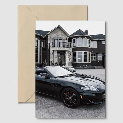Black Jaguar XK Roadster Luxury Mansion Driveway