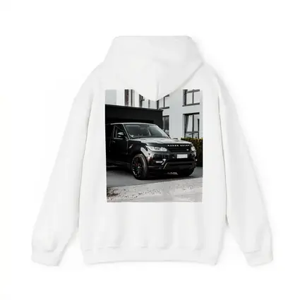 Black Range Rover Sport Parked Outside House