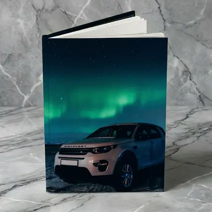Land Rover Discovery Under Northern Lights Sky