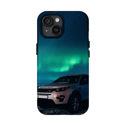 Land Rover Discovery Under Northern Lights Sky