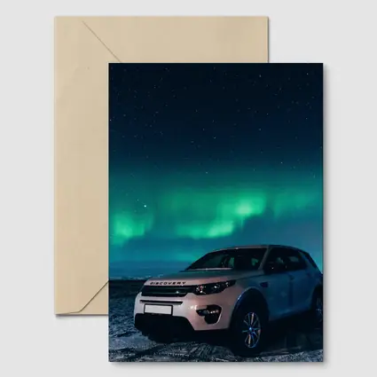 Land Rover Discovery Under Northern Lights Sky