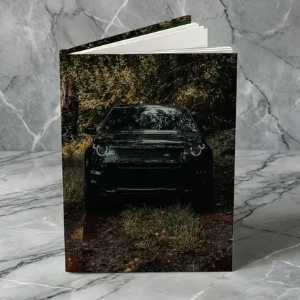 Black Land Rover Discovery Forest Trail