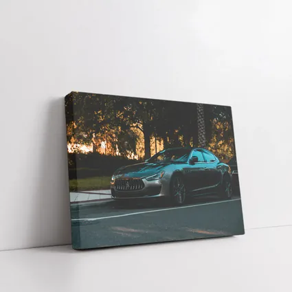 Maserati Ghibli Parked Under Evening Trees
