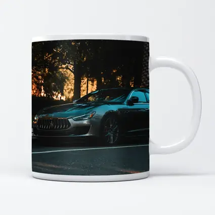 Maserati Ghibli Parked Under Evening Trees