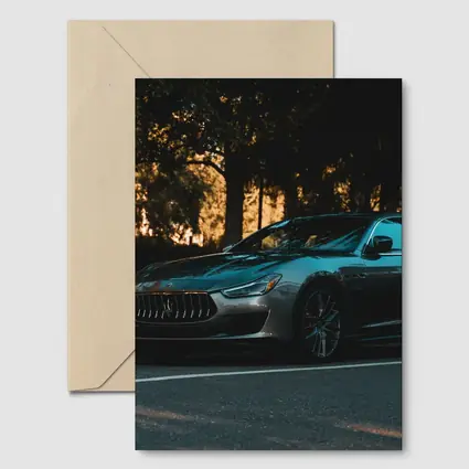 Maserati Ghibli Parked Under Evening Trees