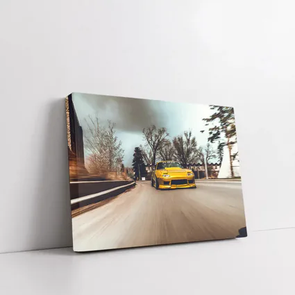 Yellow Mazda RX-7 Racing Through City Street
