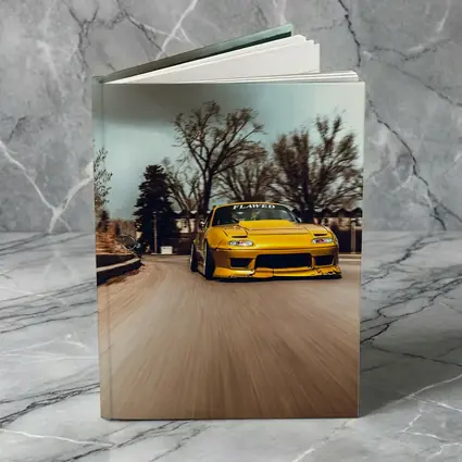 Yellow Mazda RX-7 Racing Through City Street