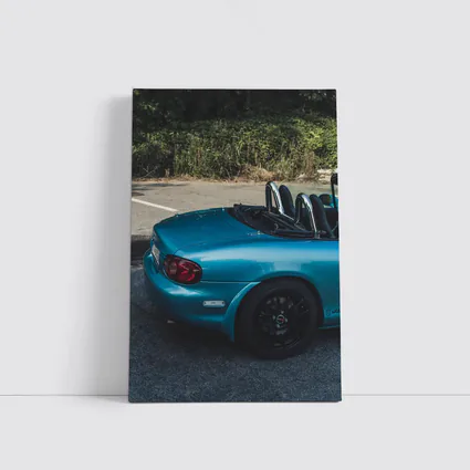 Mazda MX-5 Teal Roadster Parked Outdoors