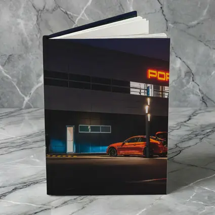 Porsche Dealership Glowing Sign Night Scene
