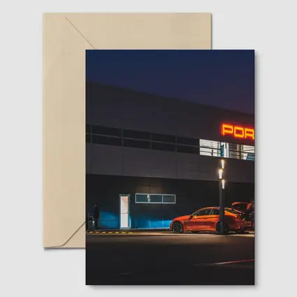 Porsche Dealership Glowing Sign Night Scene