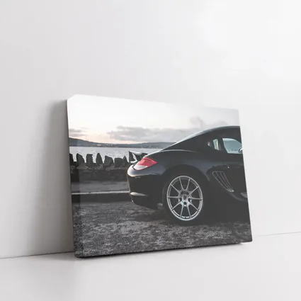 Black Porsche Cayman By Coastal Waterfront