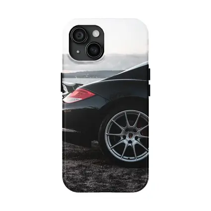 Black Porsche Cayman By Coastal Waterfront