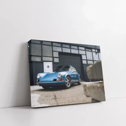 Classic Blue Porsche 911 Outside Industrial Garage