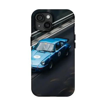 Blue Porsche 911 Racing on Mountain Road