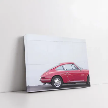 Classic Red Porsche 911 Against White Wall