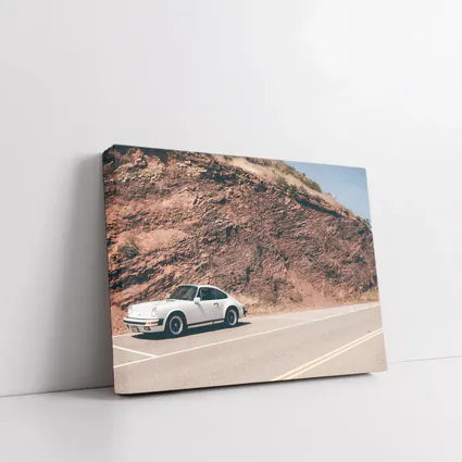 White Porsche 911 On Desert Mountain Road