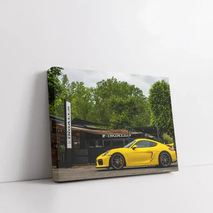 Yellow Porsche Cayman GT4 Street Parked